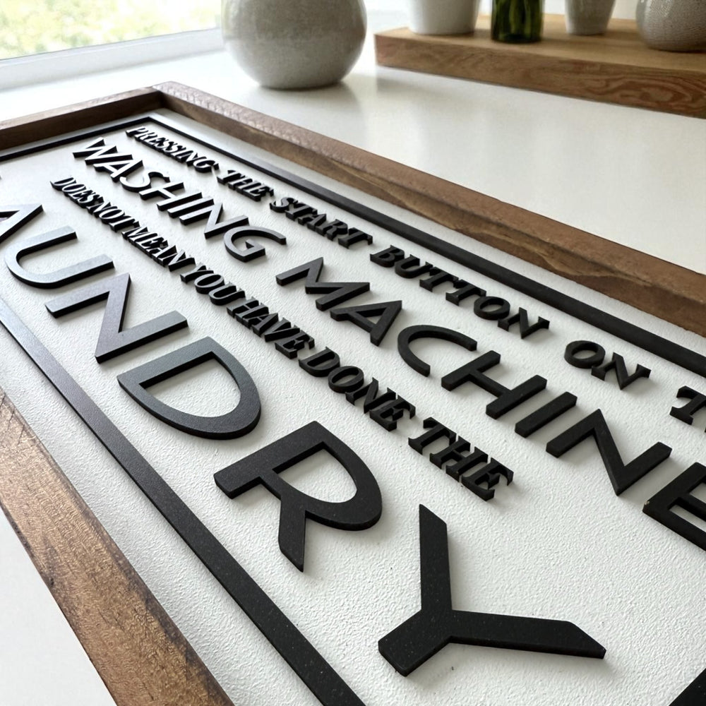 
                  
                    3D Decorative sign with laser cut text on a white surface
                  
                