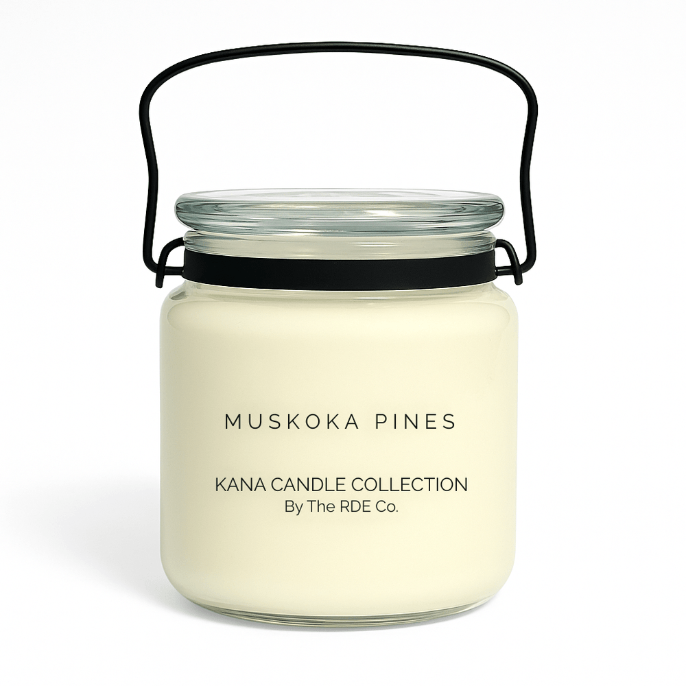 Kana Candle in Muskoka Pines, 20oz soy candle in glass jar with handle & white background