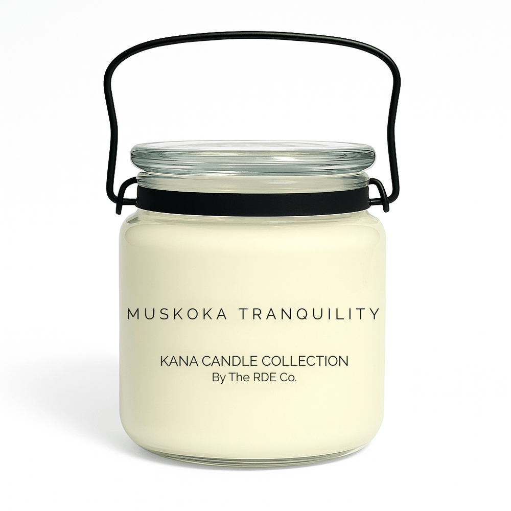 Kana Candle in Muskoka Tranquility, 20oz soy candle in glass jar with handle & white background