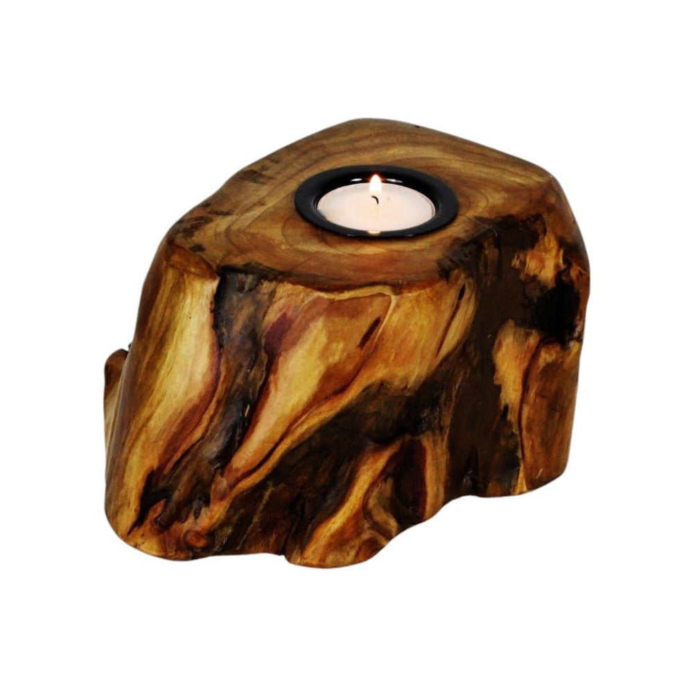 Single Live Edge Root Wood Candle Holder with a lit tealight inside