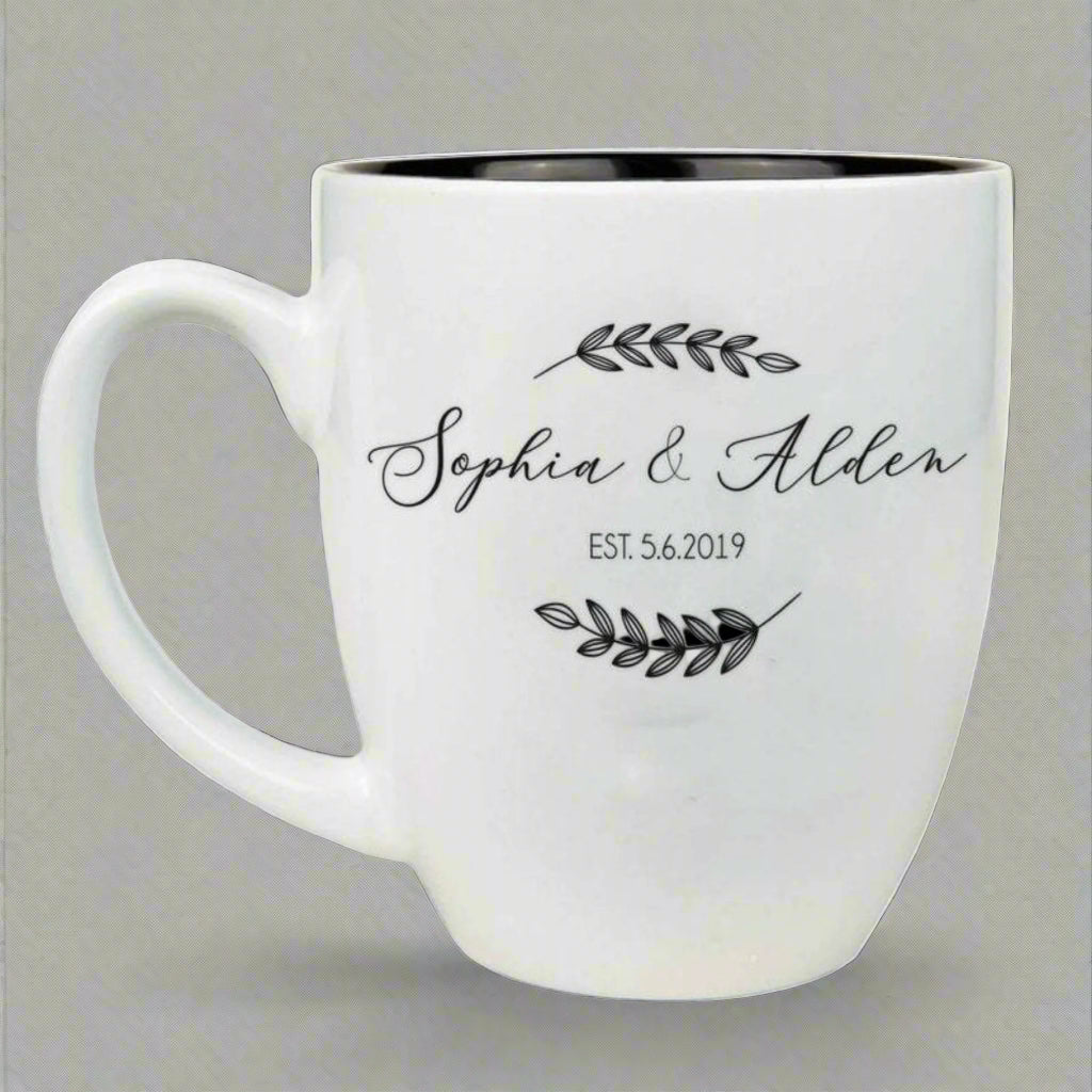 Engraved 16oz white ceramic bistro mug with black interior and custom laser design.