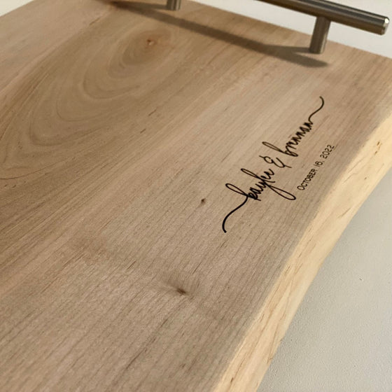 wooden surface with engraved text