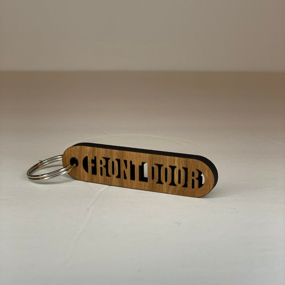 
                  
                    Cherry Wood Cut-Out Keychains Front Door - The Red Door Engraving Company Inc.
                  
                