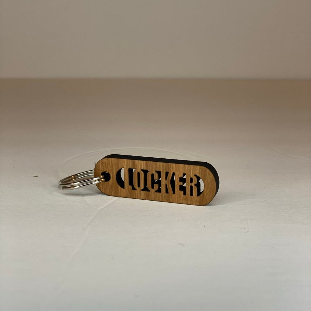 
                  
                    Cherry Wood Cut-Out Keychains Locker - The Red Door Engraving Company Inc.
                  
                