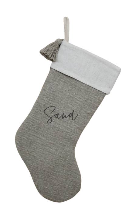 
                  
                    Christmas Stockings with Tassel Sand - The Red Door Engraving Company Inc.
                  
                