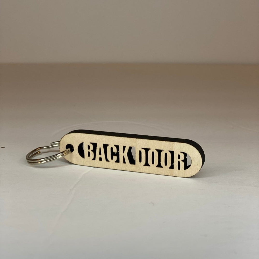 
                  
                    Maple Wood Cut-Out Keychains Back Door - The Red Door Engraving Company Inc.
                  
                