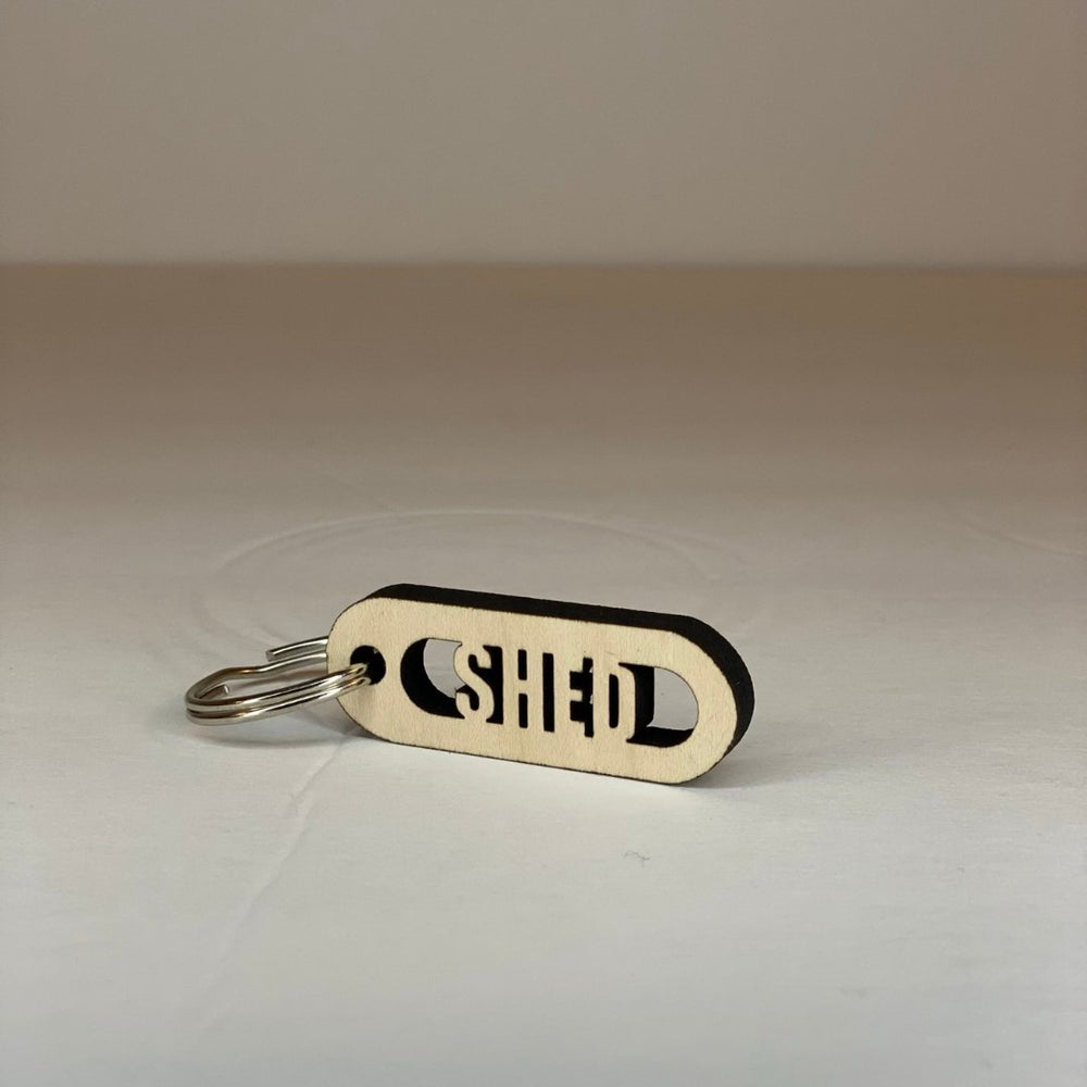 
                  
                    Maple Wood Cut-Out Keychains Shed - The Red Door Engraving Company Inc.
                  
                