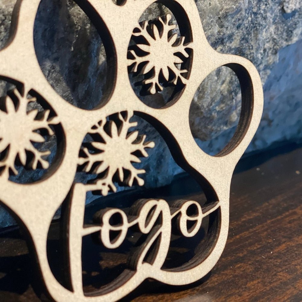 
                  
                    Wood Paw Print Ornament - The Red Door Engraving Company Inc.
                  
                