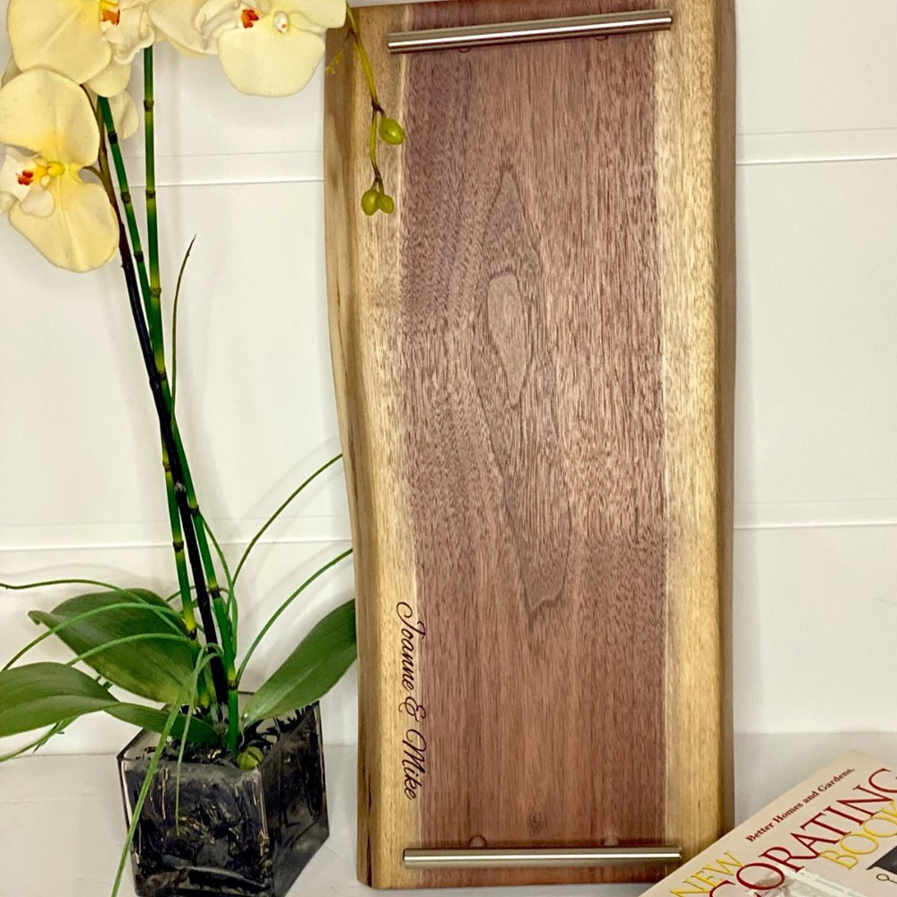 
                  
                    Walnut Live Edge Charcuterie Board - 20" with Handles and Feet - The Red Door Engraving Company Inc.
                  
                