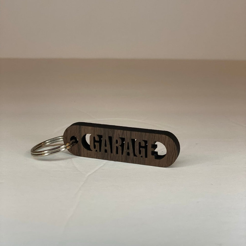 
                  
                    Walnut Wood Cut-Out Keychains Garage - The Red Door Engraving Company Inc.
                  
                